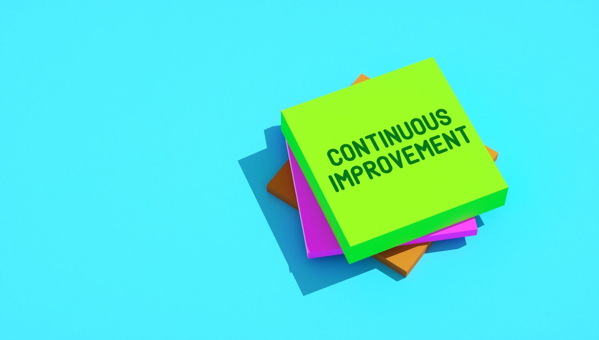 Minimalist "Continuous Improvement" Message on Stacked Sticky Notes